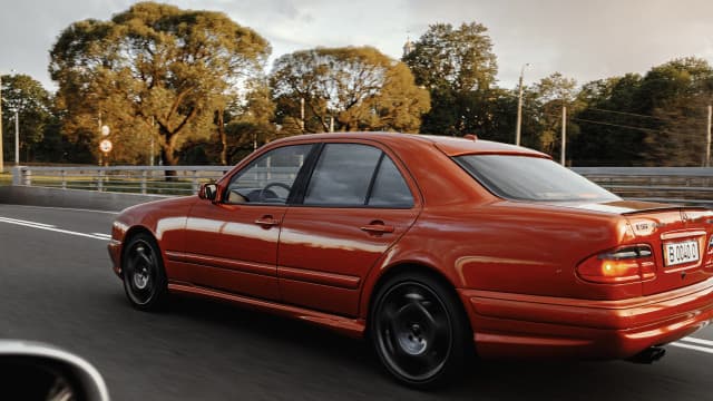 Mercedes-Benz E-Класс II (W210, S210) Рестайлинг SOLAR ORANGE E55 4WD